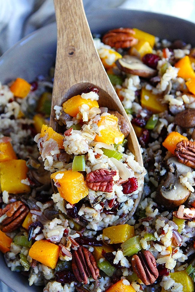 Wild Rice Stuffing With Butternut Squash, Mushrooms, Dried Cranberries, Herbs, And Pecans Is A Delicious Gluten-Free Stuffing For The Holidays! #stuffing #glutenfree #vegan #vegetarian #healthyrecipe #thanksgiving #Christmas #holidays #sidedish Gluten Free Stuffing in bowl