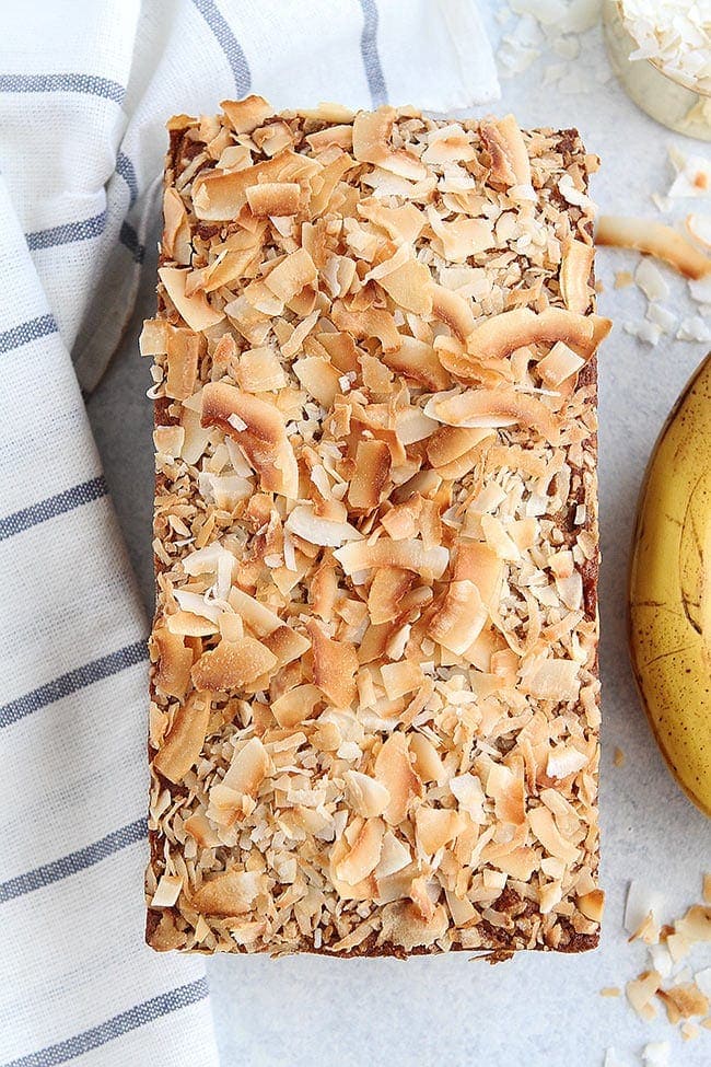 Coconut Banana Bread Is Made With Coconut Oil, Coconut Extract, and Coconut! The Perfect Banana Bread Recipe For Coconut Lovers! #coconut #bananabread #banana #baking #bread #quickbread #breakfast #snack Coconut Banana Bread Recipe