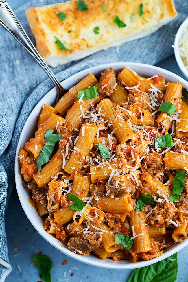 Rigatoni Pasta With Sausage, Marinara Sauce, Mozzarella Cheese, Parmesan Cheese, And Fresh Basil Is The Perfect Recipe For An Easy, Delicious Weeknight Dinner #rigatoni #pasta #sausage #dinner #easydinner #Italian #easyrecipe Rigatoni with Sausage