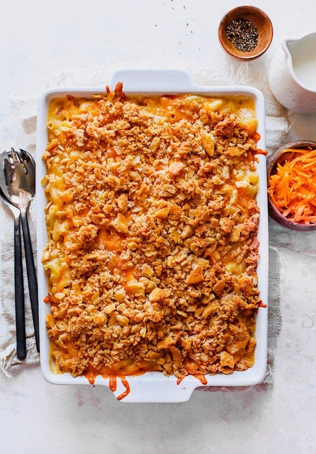 The BEST Baked Mac and Cheese Recipe! A family favorite! #macandcheese #macaroniandcheese #pasta #dinner #easyrecipe #kidfriendly Baked Mac and Cheese with panko cracker topping in white baking dish.