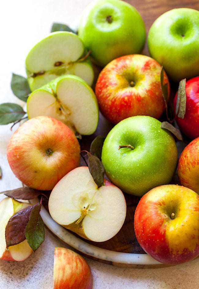 apples in bowl to make applesauce.