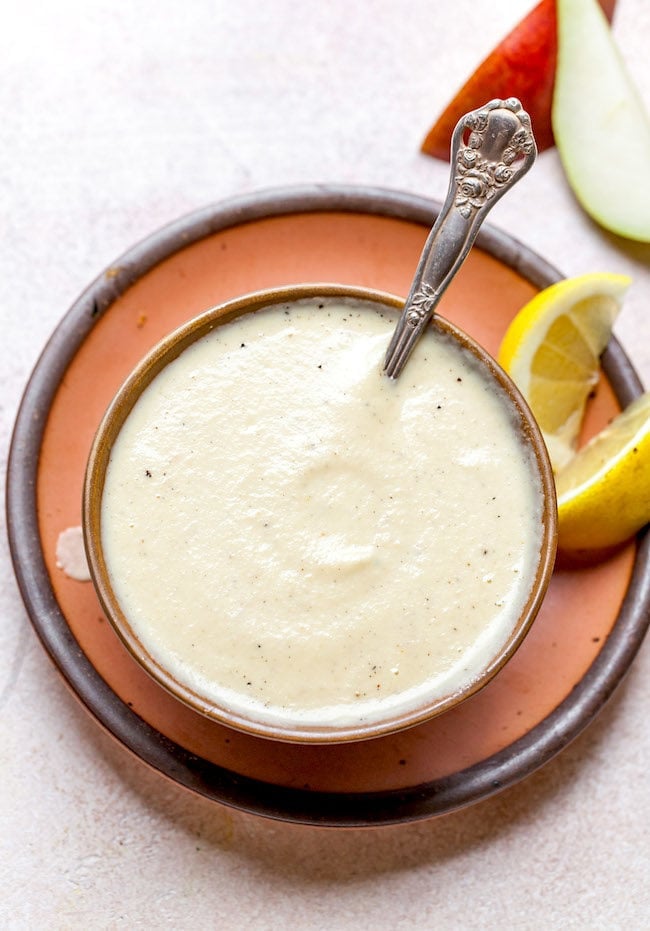Roasted Pear Vinaigrette in bowl with spoon for pear salad recipe.