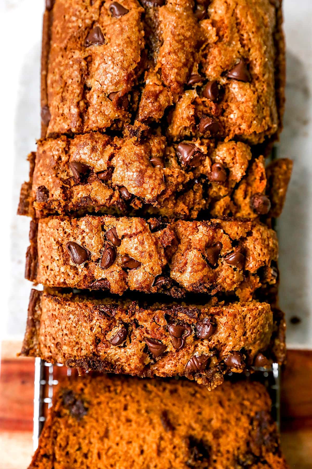 pumpkin chocolate chip bread cut in slices. 