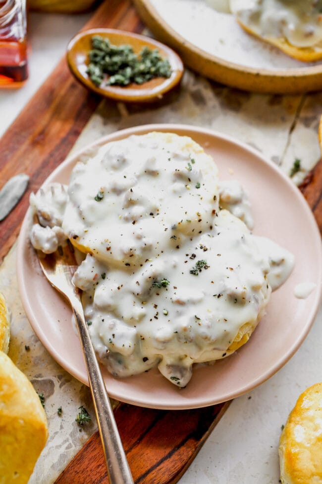 biscuits and gravy on plate.