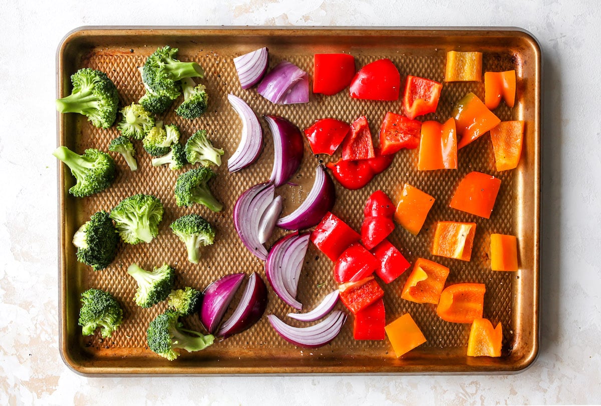 cut up vegetables on baking sheet.