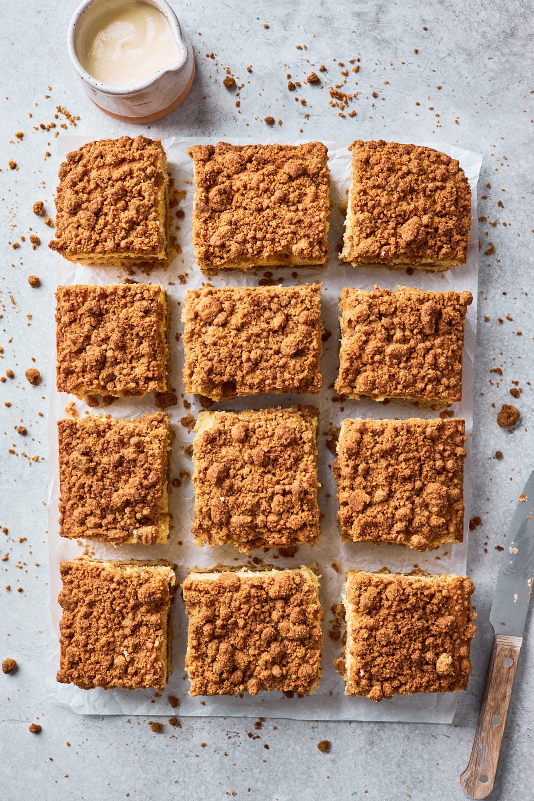 cinnamon coffee cake cut in squares.