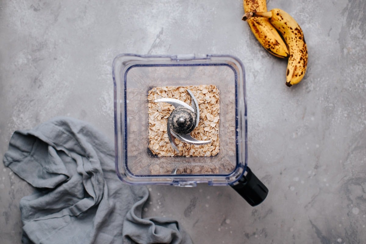 making oat flour in blender with oats.