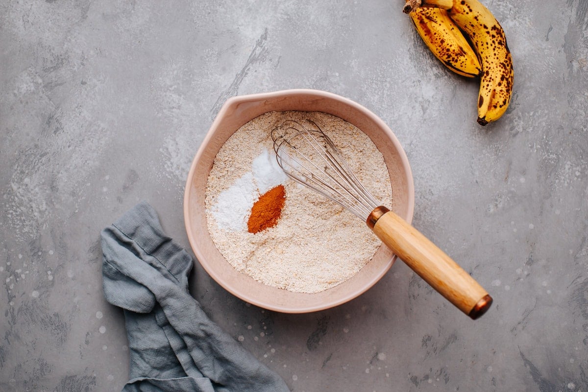 mixing dry ingredients in mixing bowl with whisk.