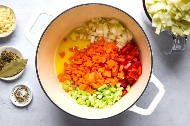 diced vegetables in olive oil in large pot.