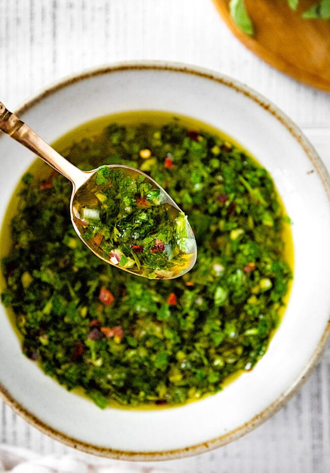 chimichurri sauce on spoon