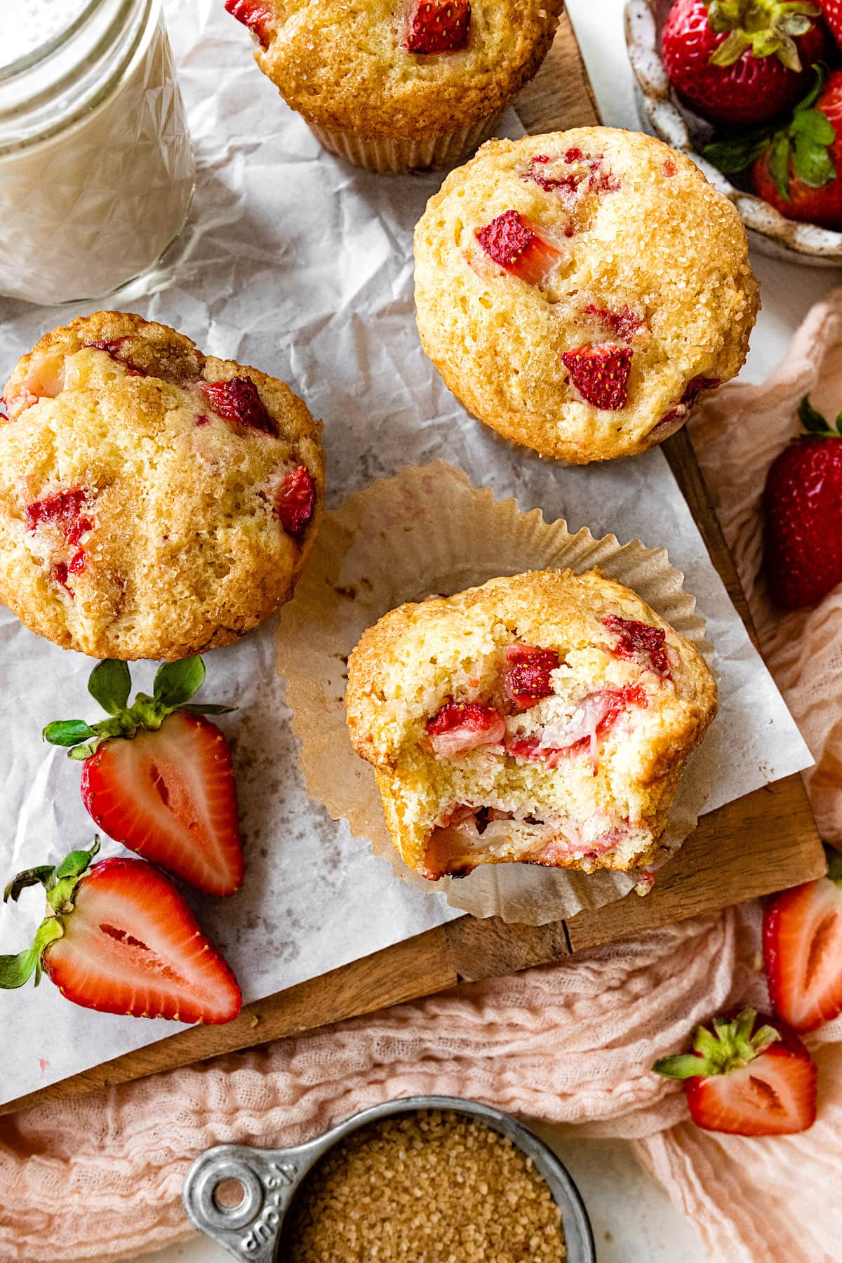 strawberry muffins with fresh strawberries and turbinado sugar.