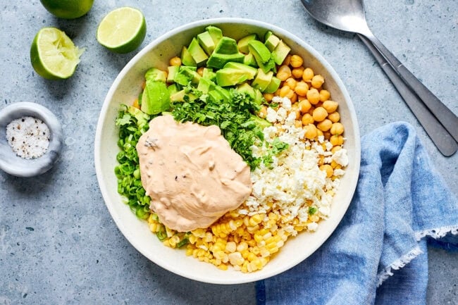 chipotle chickpea corn salad ingredients in bowl.