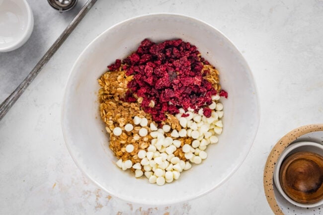 white chocolate energy ball ingredients in bowl.