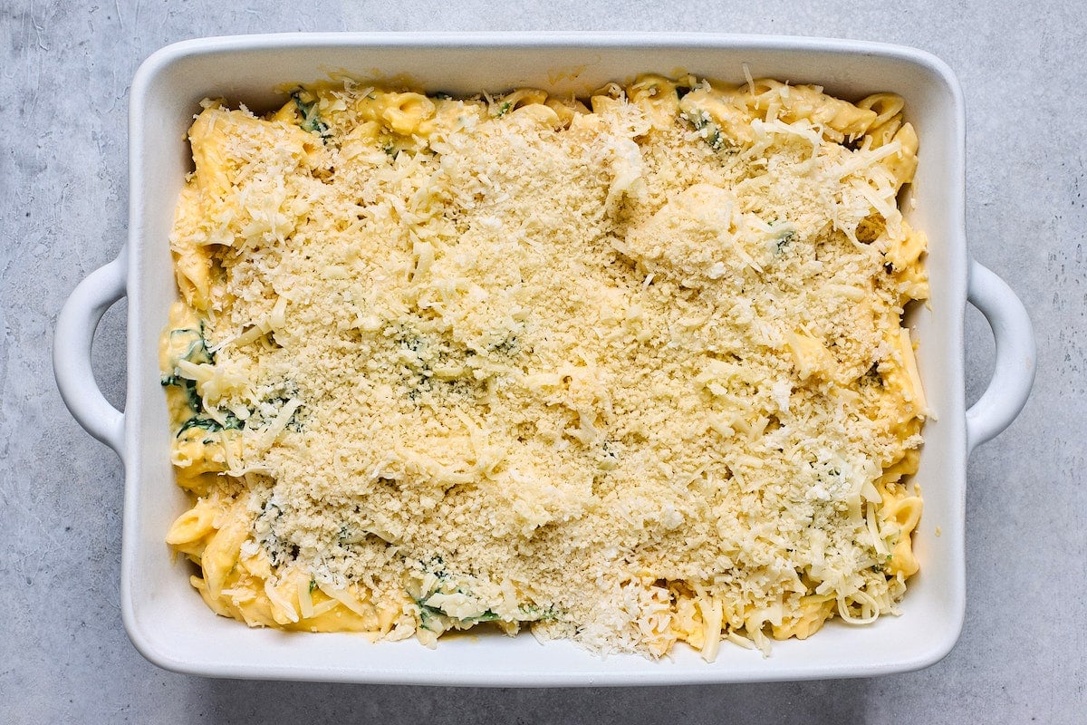 butternut squash baked ziti in white baking dish with panko breadcrumb topping before going in oven.
