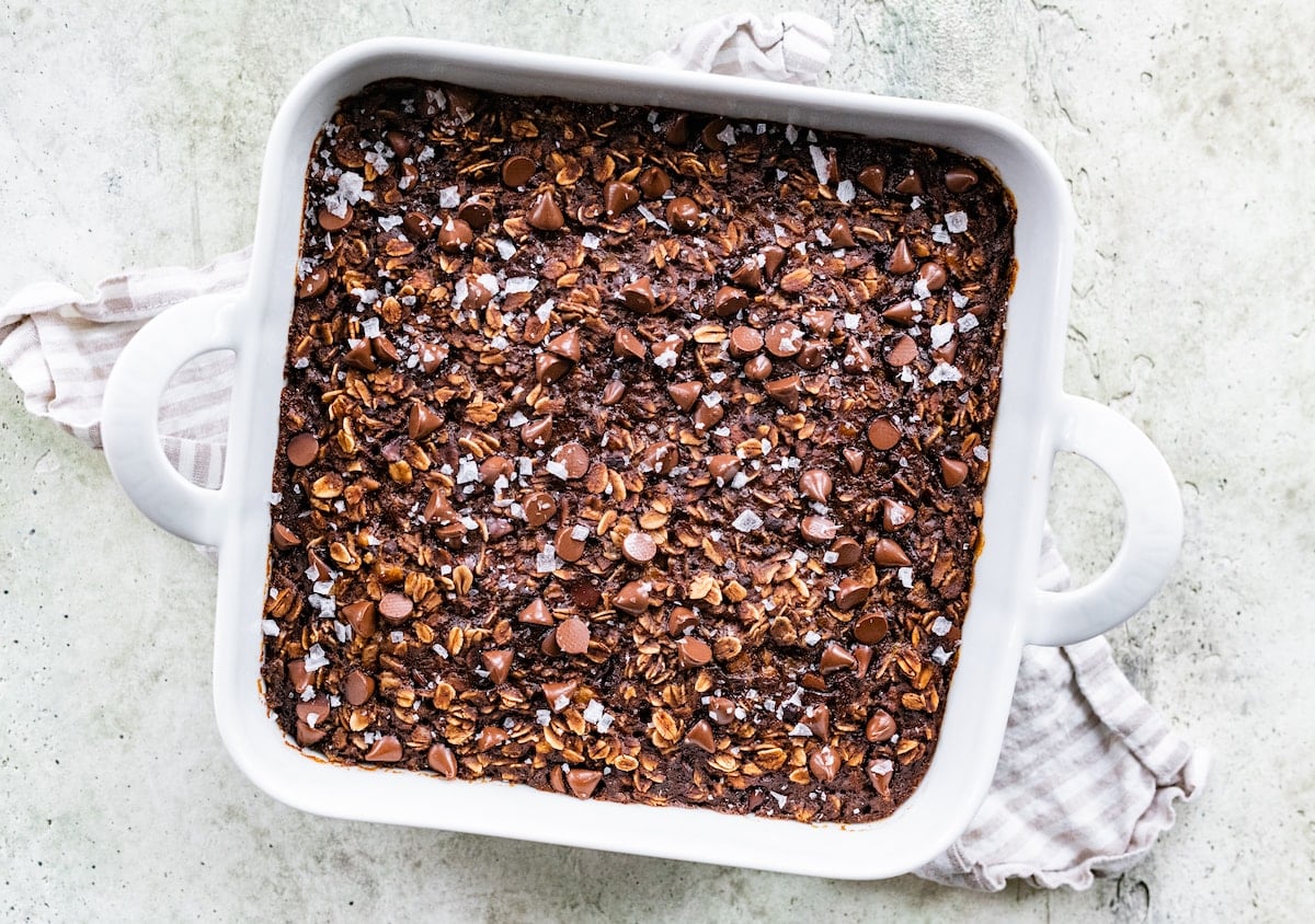 chocolate banana baked oatmeal with flaky sea salt in baking pan.