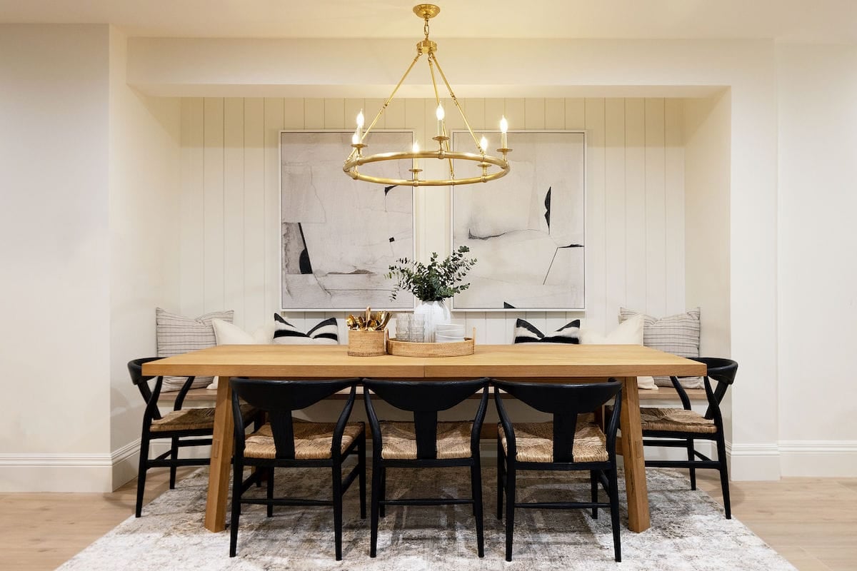 dining table and dining chairs with chandelier.