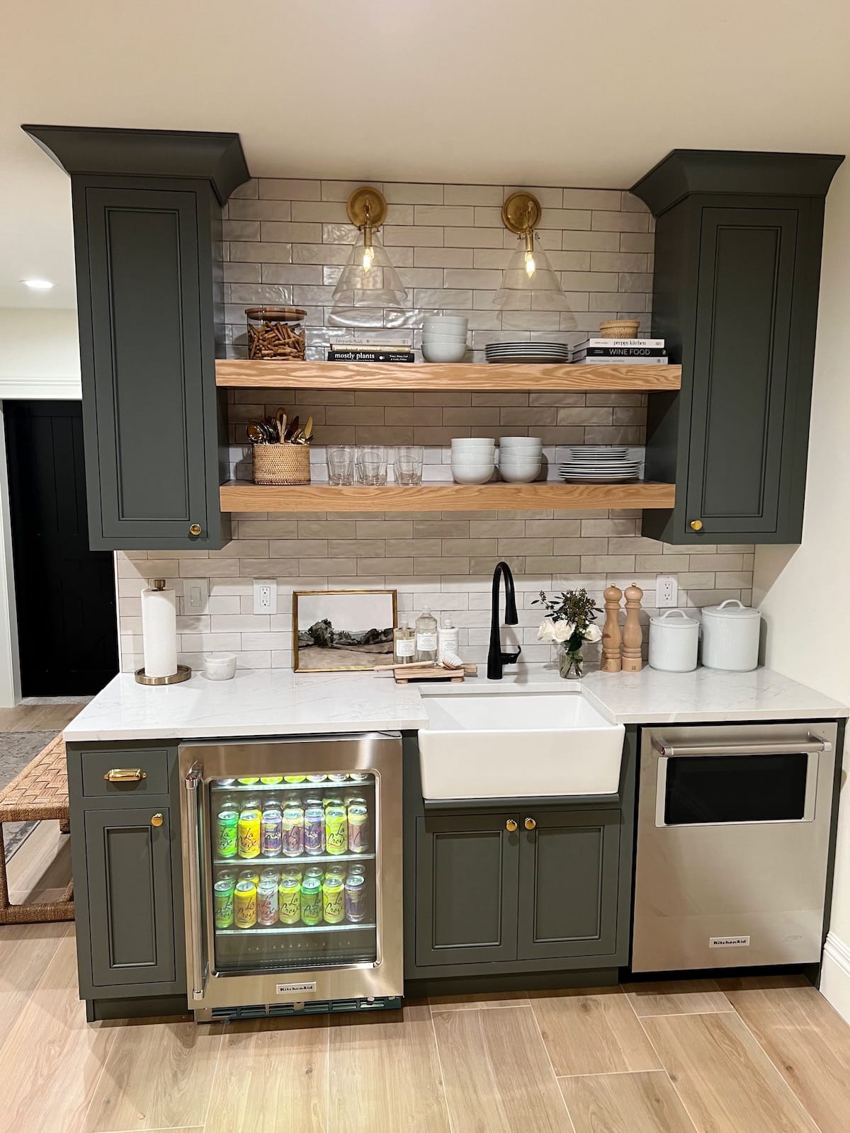 basement kitchen area with open shelving.