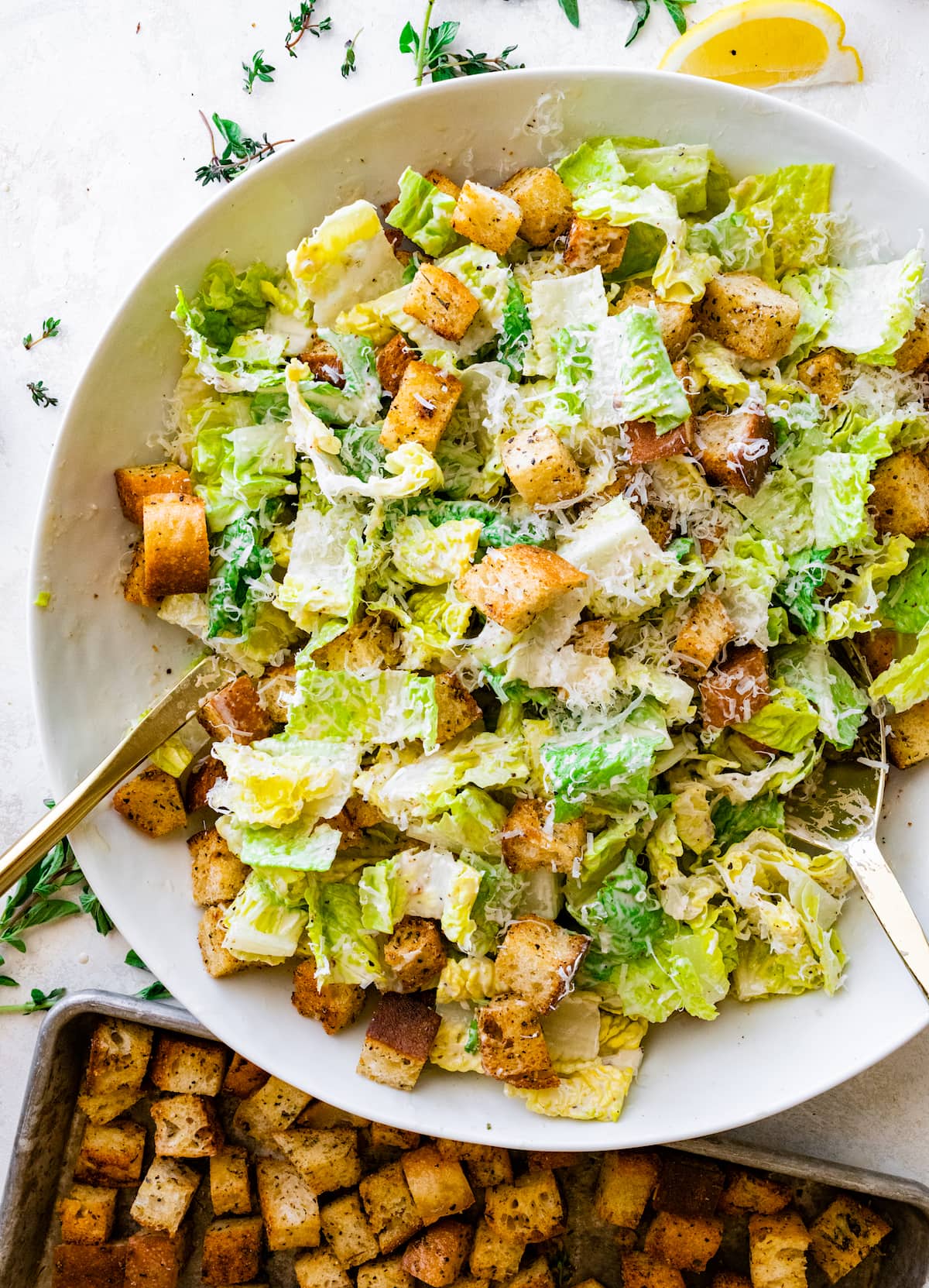 caesar salad with croutons in salad bowl.