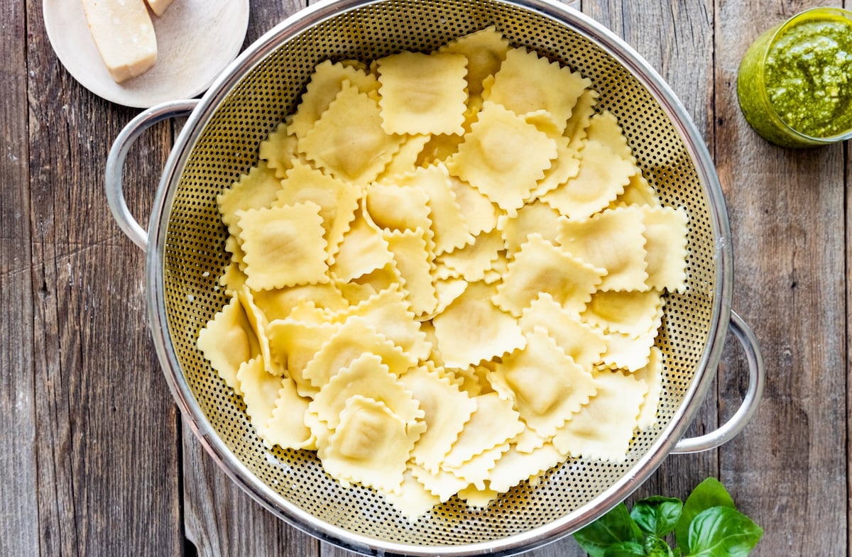 cheese ravioli in colander.