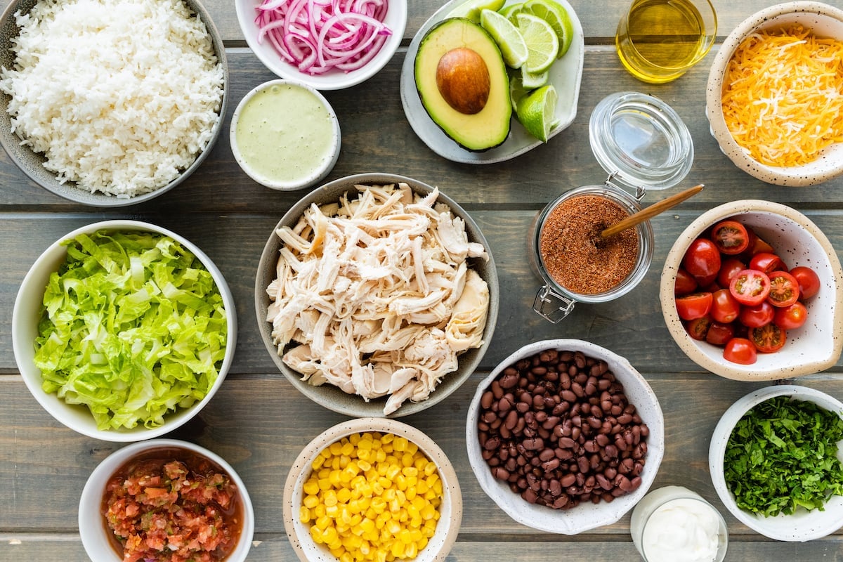 ingredients in bowls to make burrito bowls.