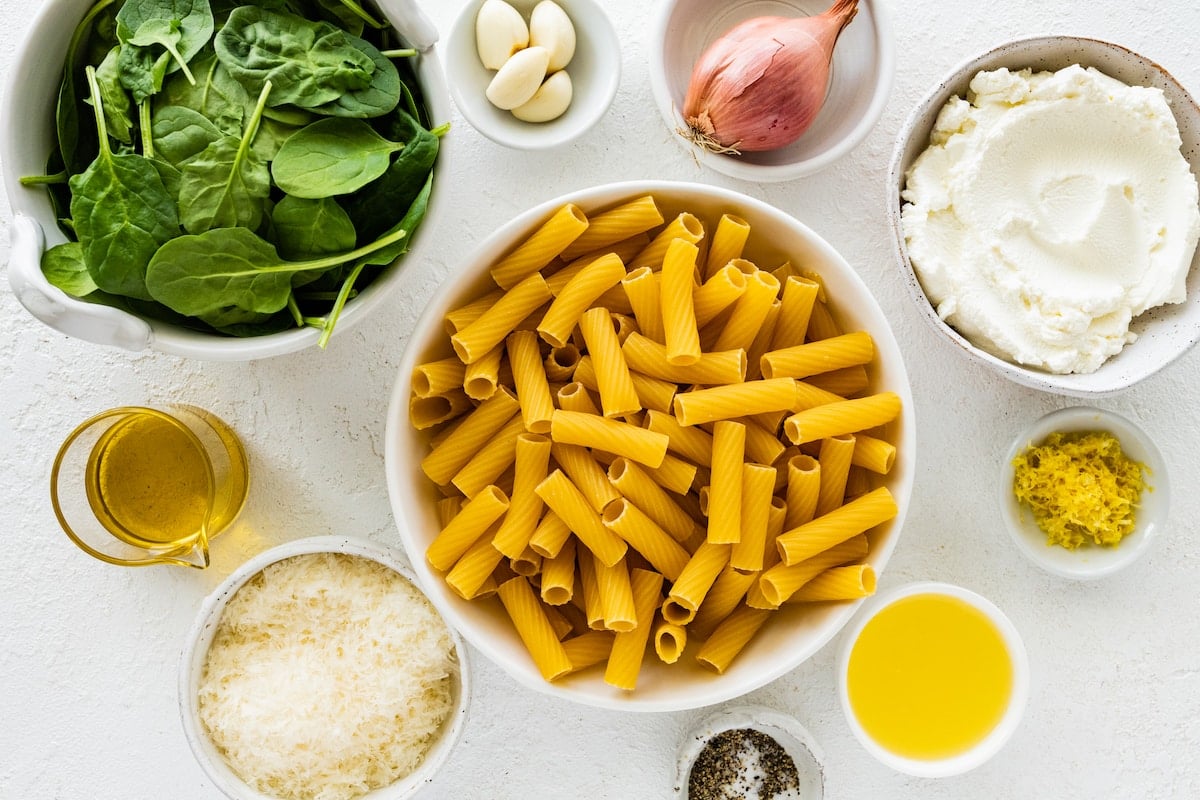 ingredients to make lemon ricotta pasta in bowls.