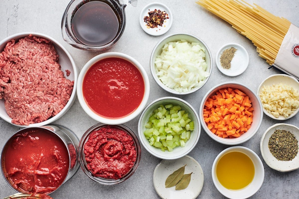 spaghetti ingredients in bowls.