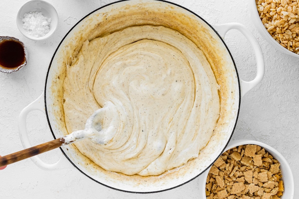 brown butter and melted marshmallows in pot with wooden spoon.