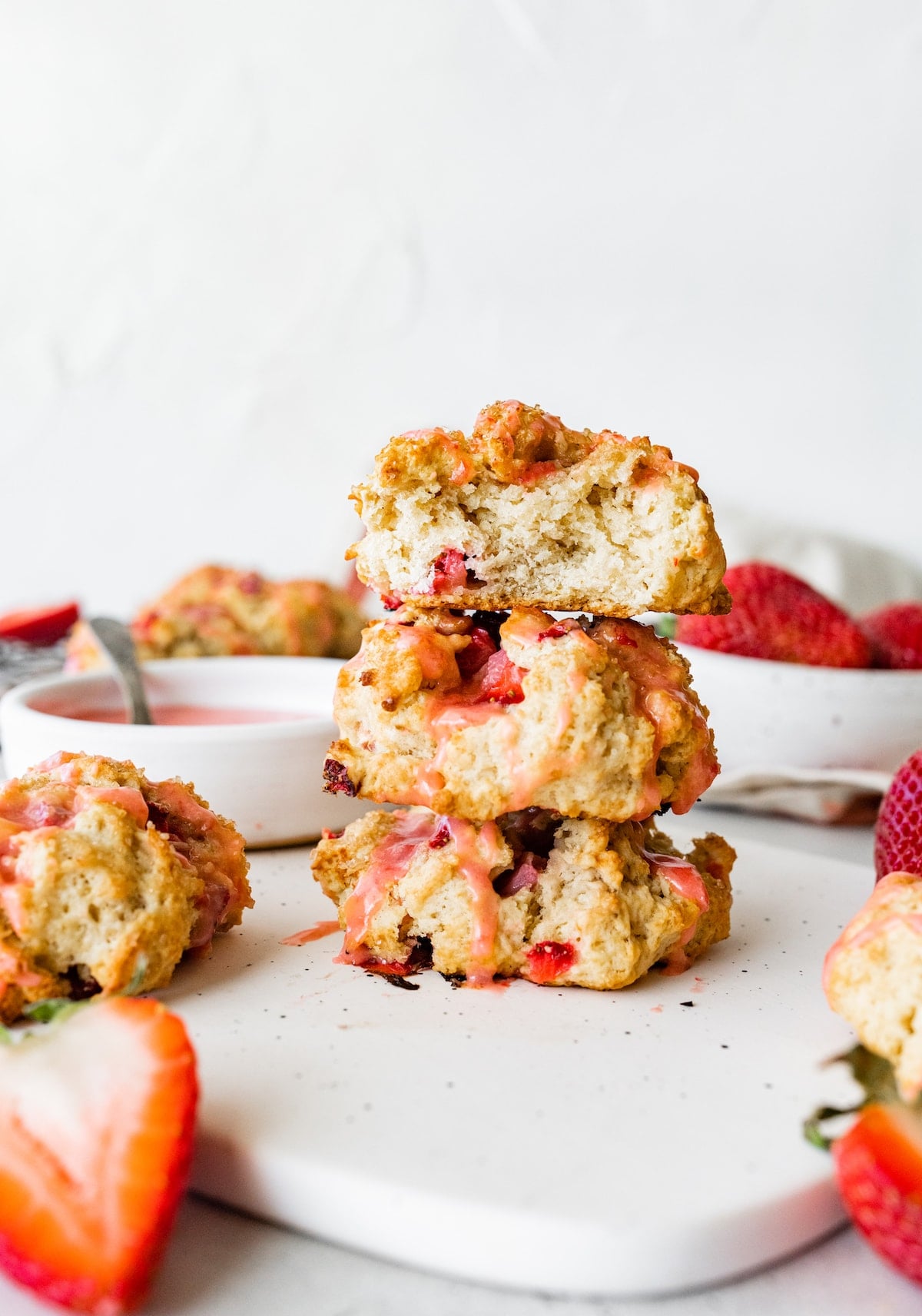 stack of strawberry biscuits with fresh strawberry glaze.