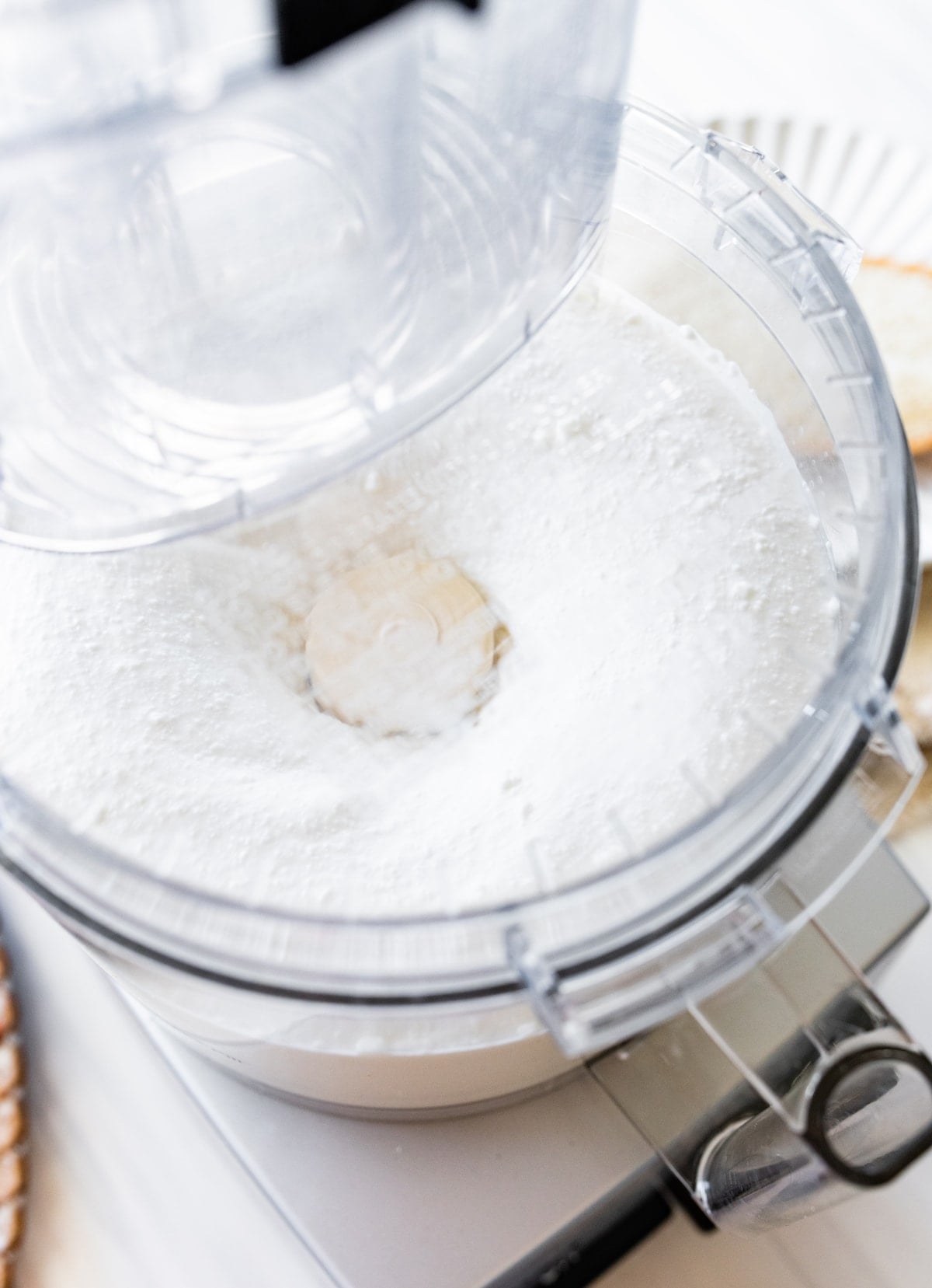 cottage cheese being whipped in food processor.