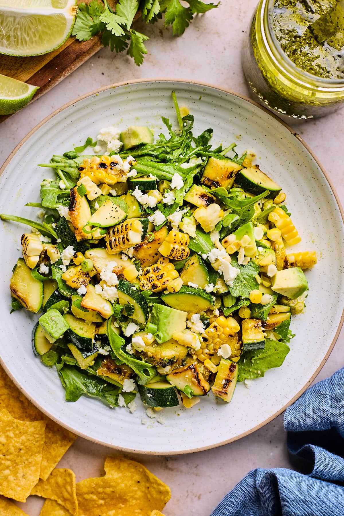 grilled corn zucchini salad on plate.