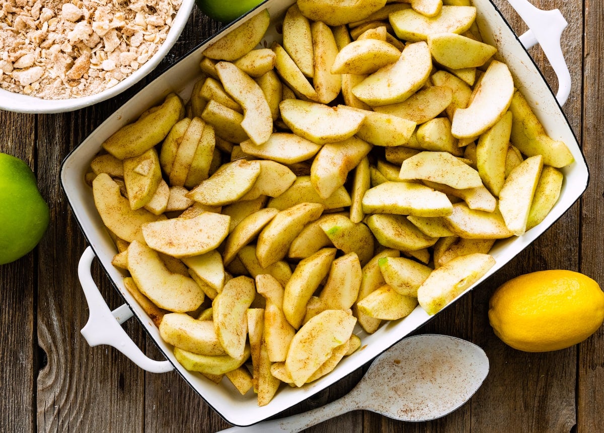 apple filling for apple crisp in baking dish.