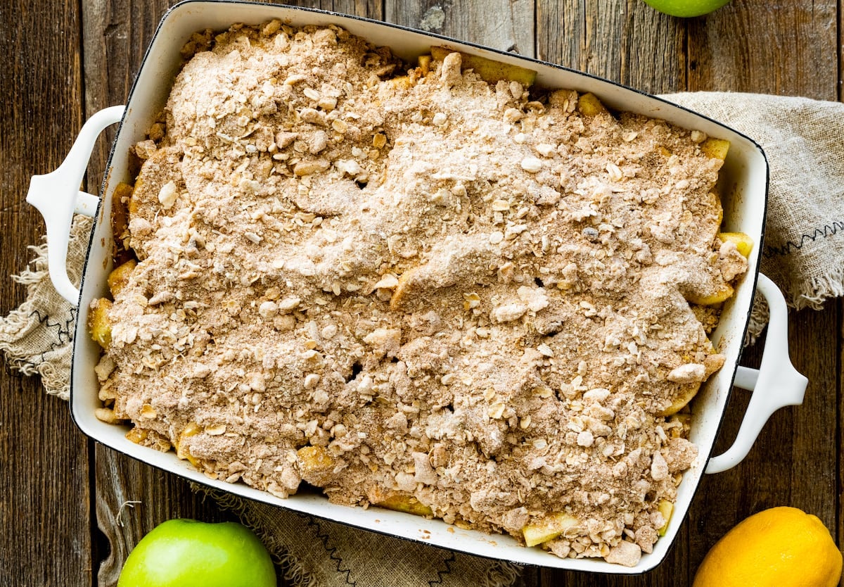 apple crisp in white baking dish ready for the oven.