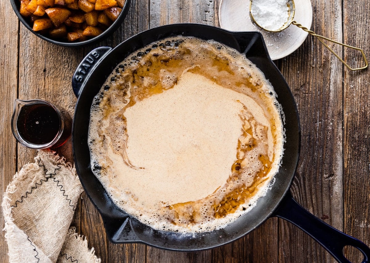 Dutch baby batter in cast iron skillet.