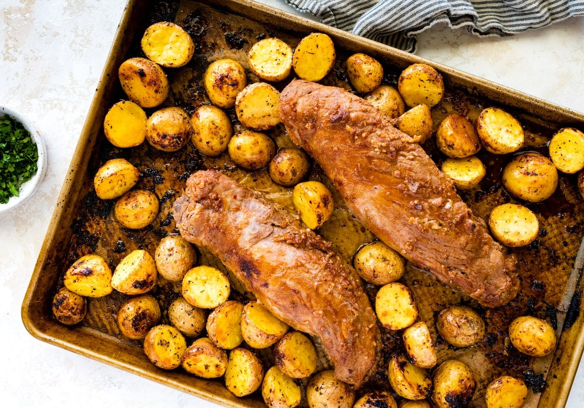 sheet pan baked pork tenderloin with potatoes.