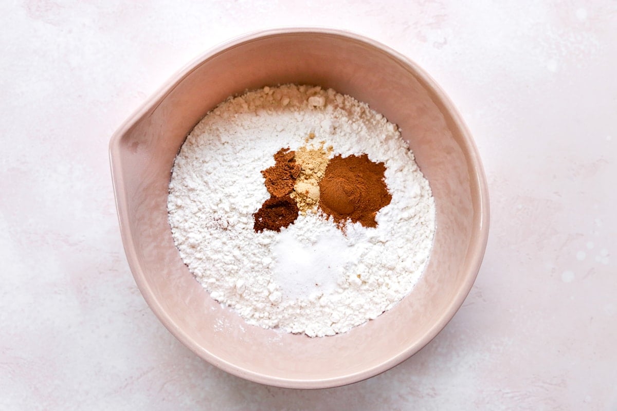 dry ingredients in mixing bowl to make pumpkin chocolate chip muffins.