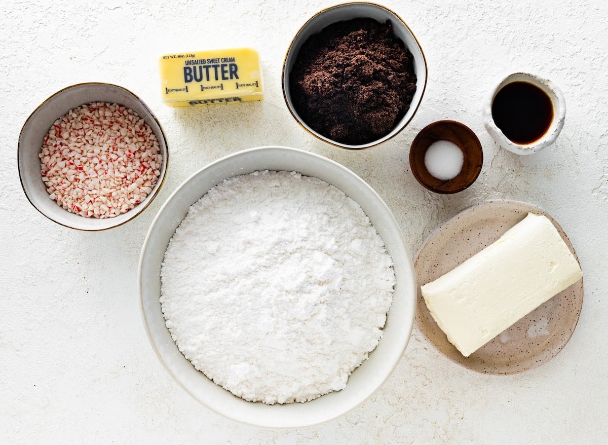 ingredients in bowls to make peppermint Oreo cream cheese filling.