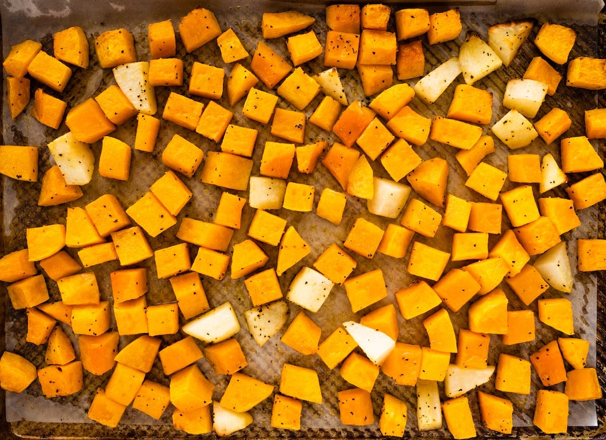 roasted butternut squash and roasted pears on baking sheet.