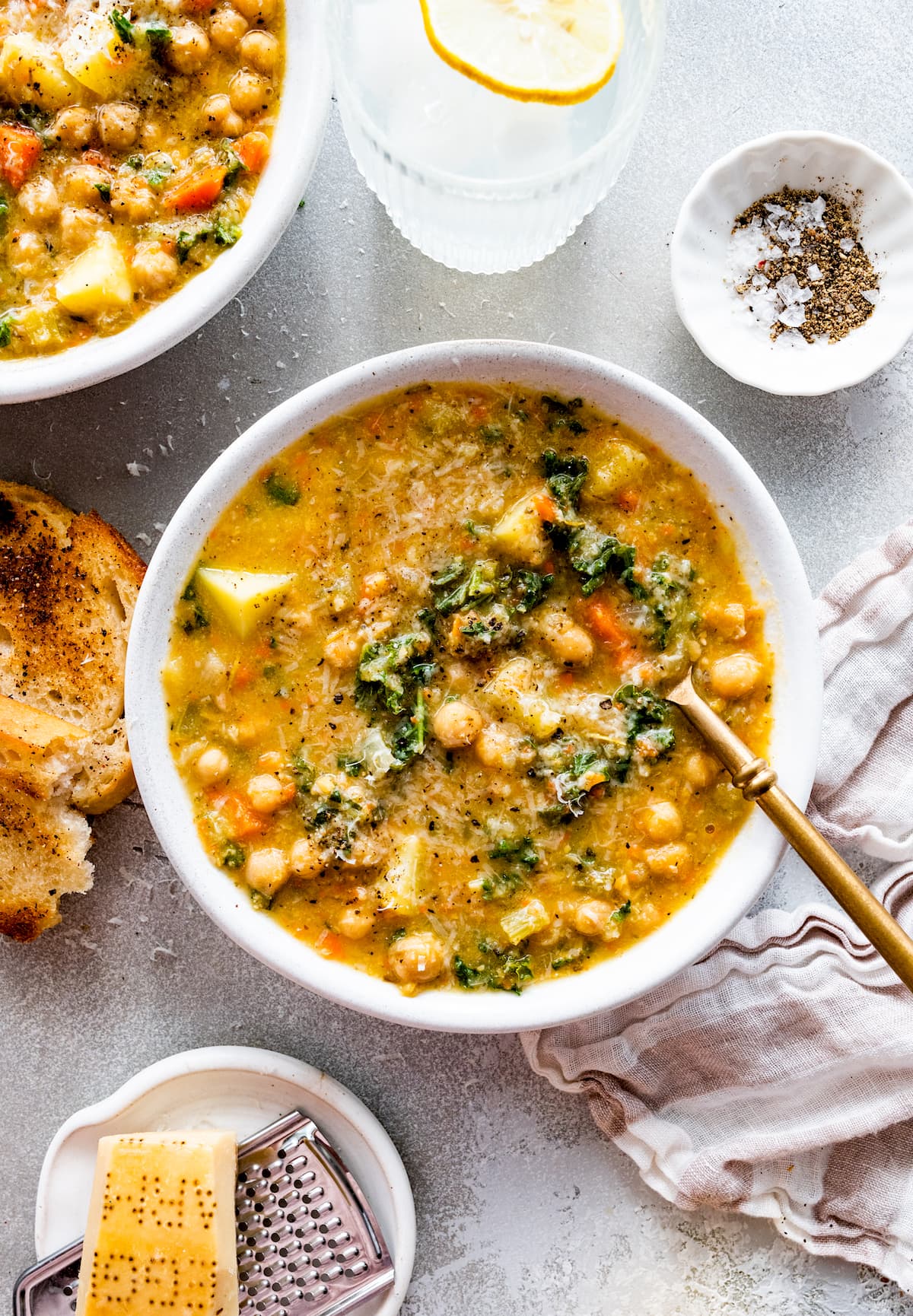 chickpea soup in bowl with spoon.