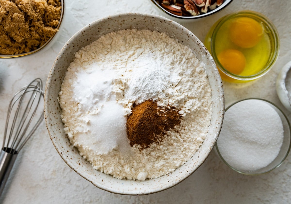 dry ingredients in bowl to make maple pecan chocolate chip cookies.