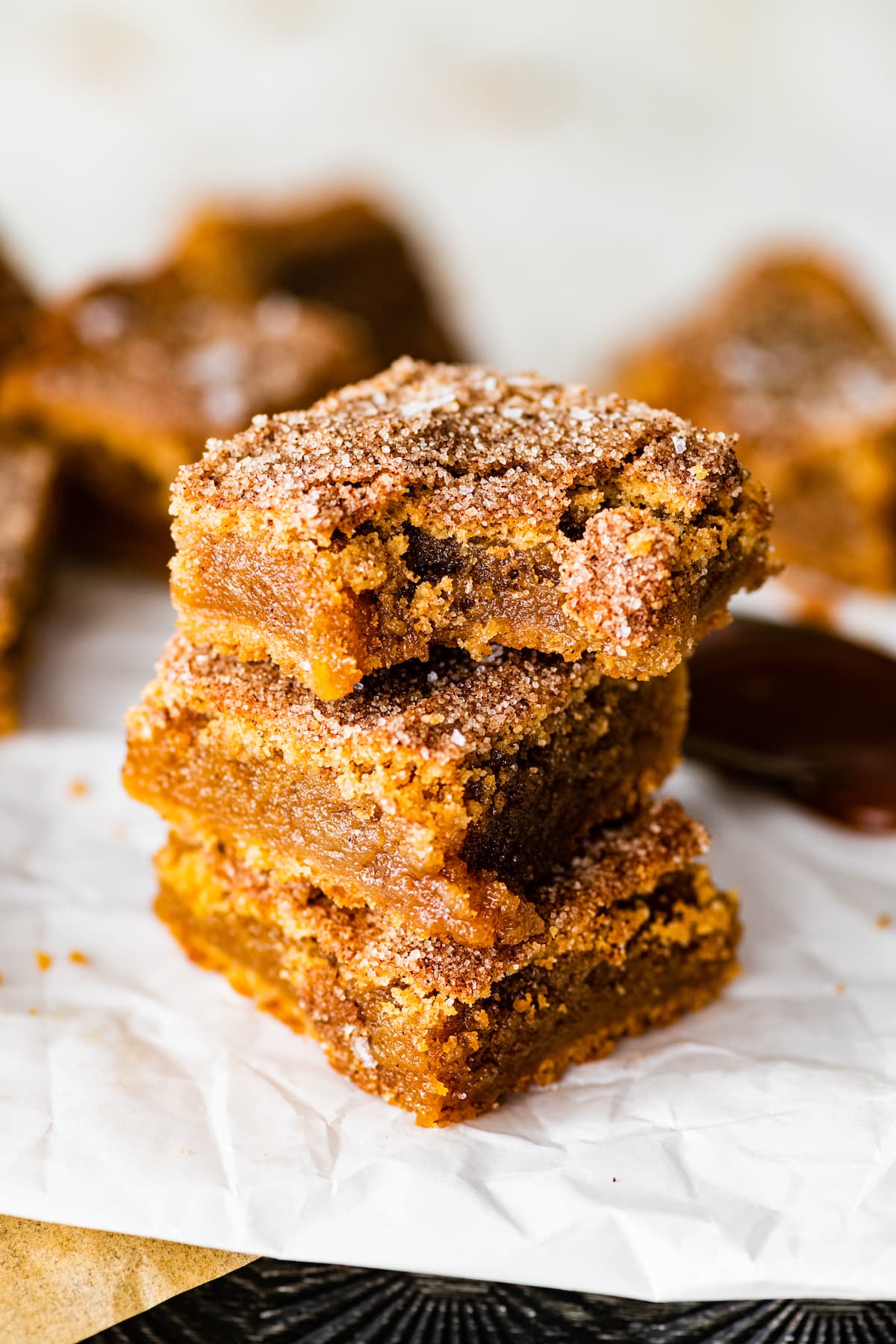 stack of brown butter salted caramel snickerdoodle blondies.