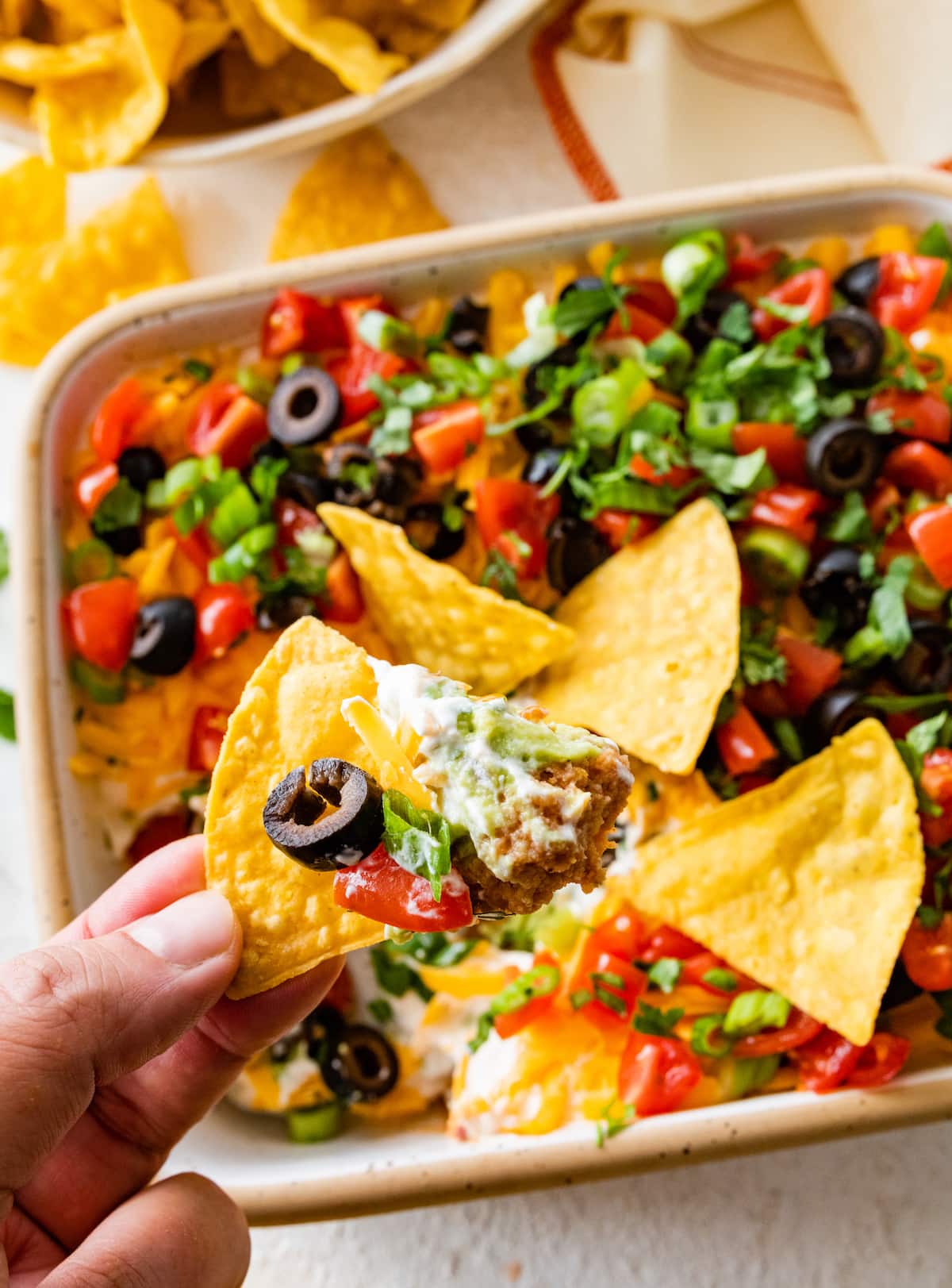 a chip with 7 layer dip on it.