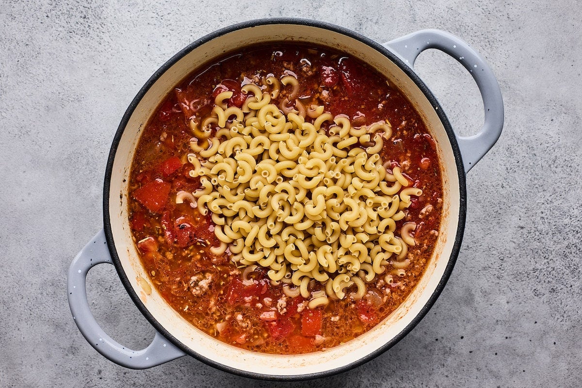 goulash with elbow macaroni in large pot.
