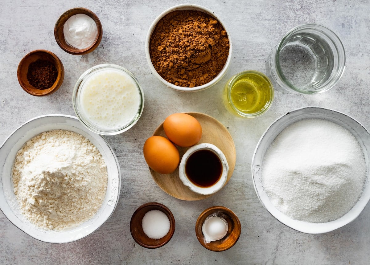 ingredients in bowls to make chocolate cake.