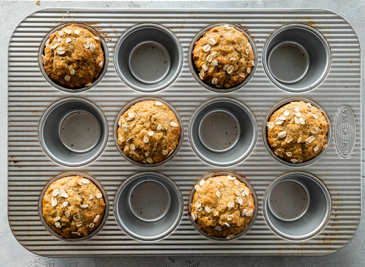 banana oatmeal muffins in muffin pan.