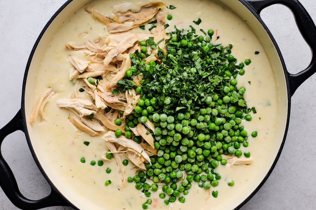 chicken pot pie filling in skillet.