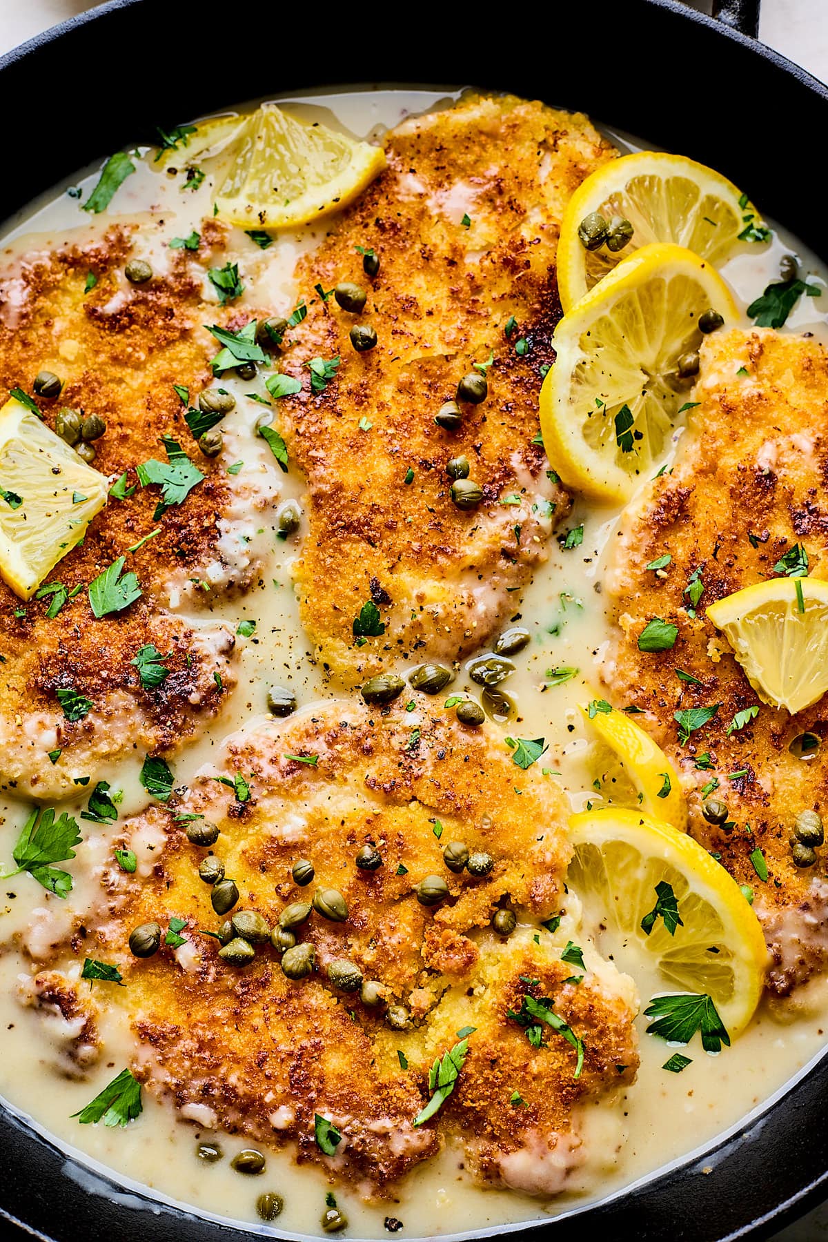 chicken piccata in skillet.