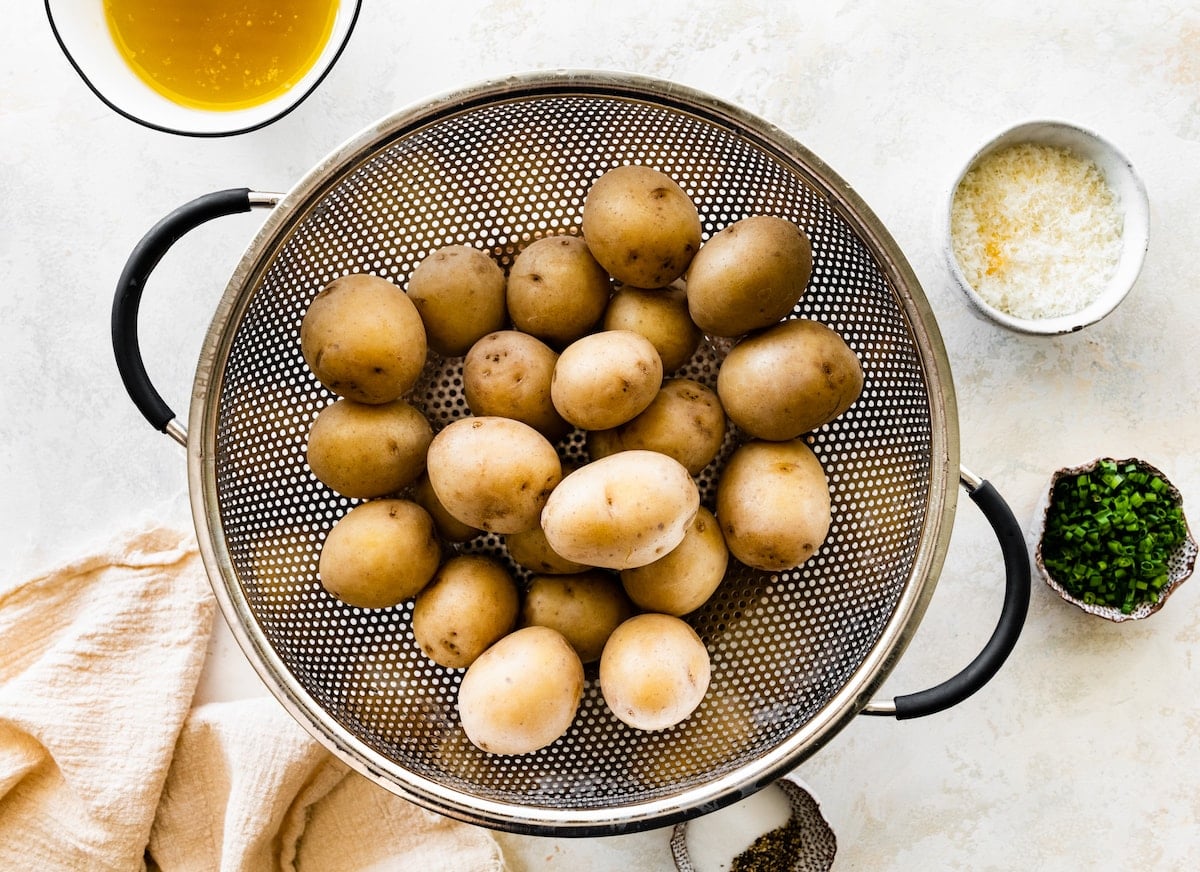 cooked potatoes in colander.