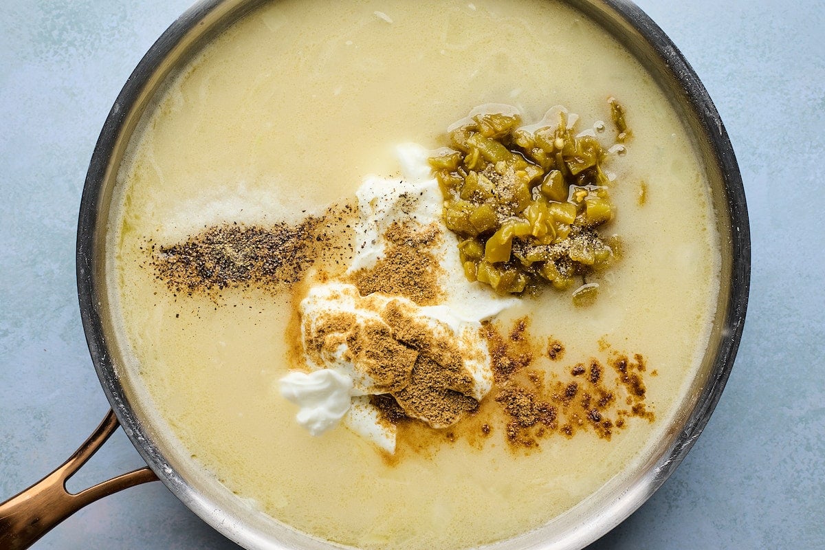 white chicken enchilada sauce in large skillet.