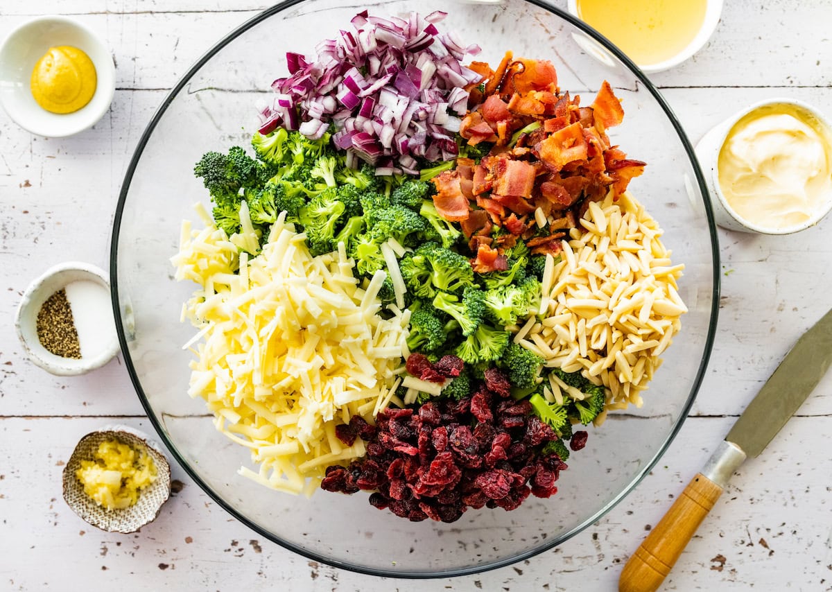 broccoli salad ingredients in mixing bowl.