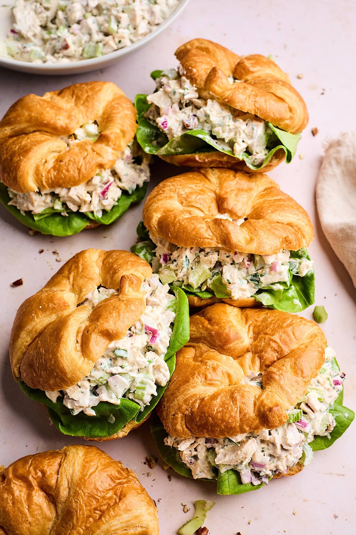 chicken salad in croissants with lettuce.